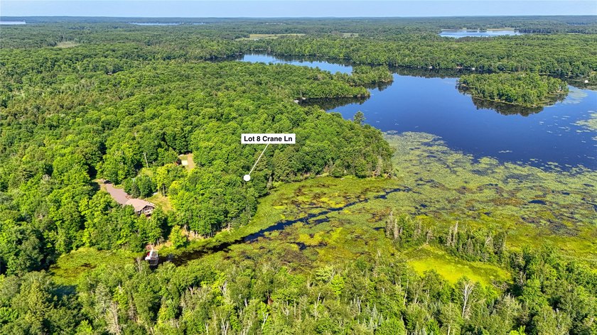 Build your Northwoods getaway on this beautiful waterfront lot - photo 10