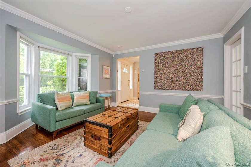 Welcome to this sunlit all brick center hall colonial located in - photo 5