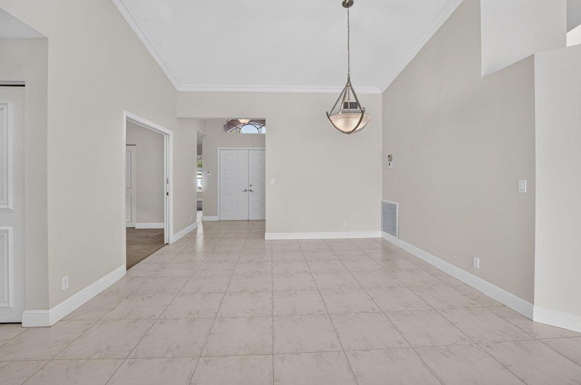 Watch the sunrise from this 3 bedroom-2 bath home on a LAKEFRONT - photo 11
