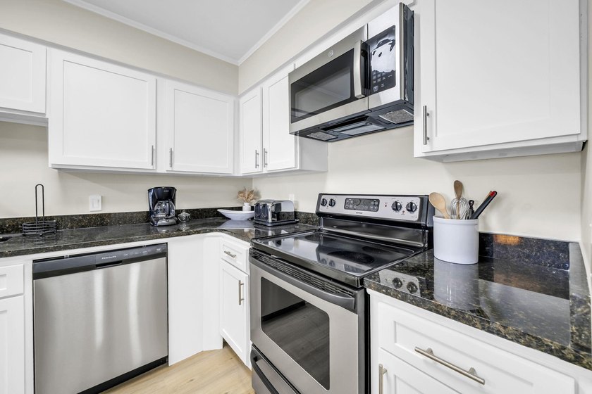 This fabulous direct beach front condo has been recently - photo 3