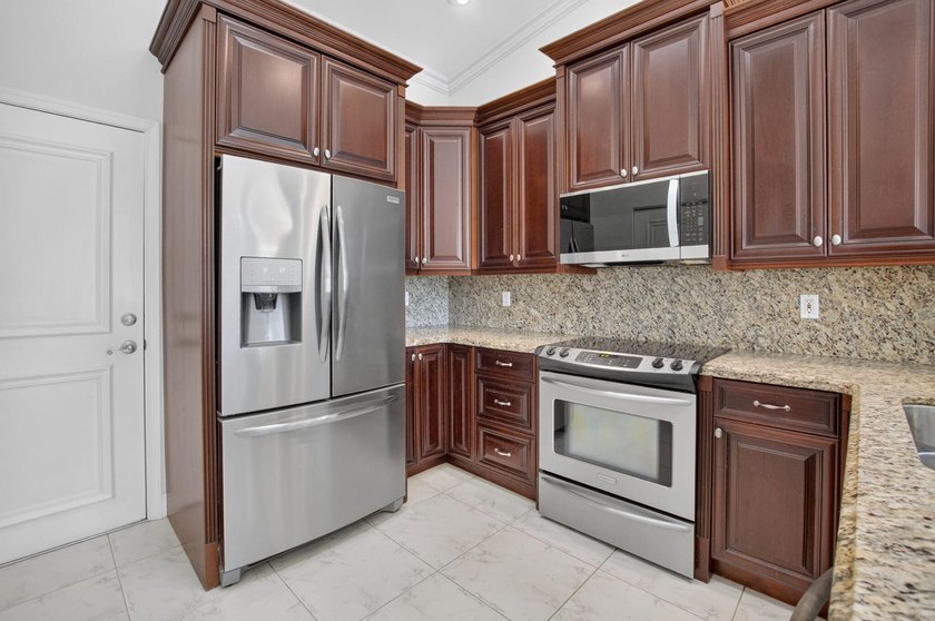 Watch the sunrise from this 3 bedroom-2 bath home on a LAKEFRONT - photo 14
