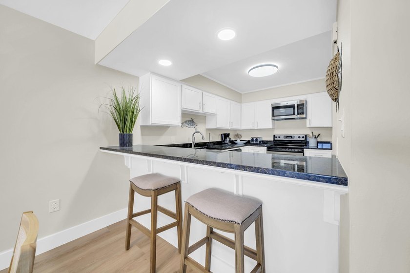 This fabulous direct beach front condo has been recently - photo 7
