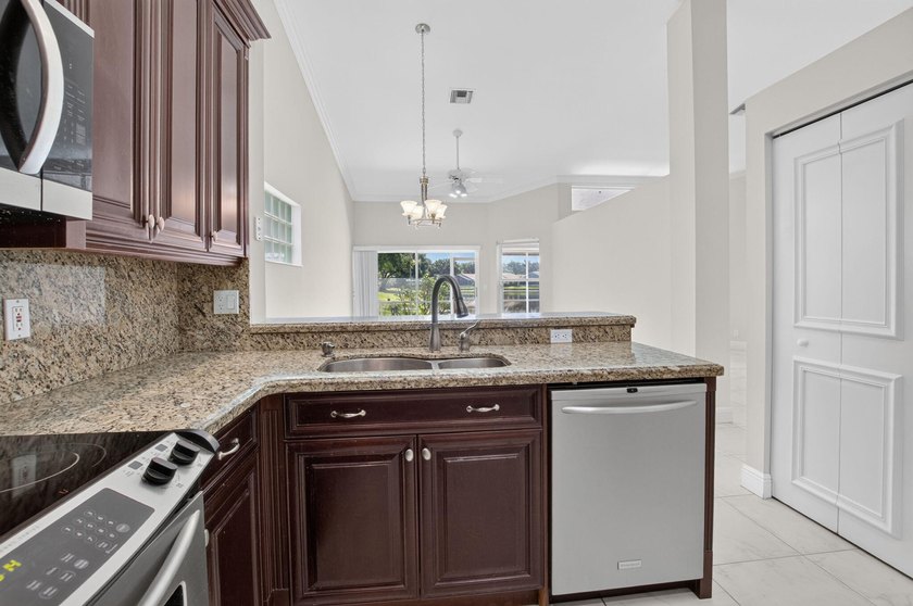 Watch the sunrise from this 3 bedroom-2 bath home on a LAKEFRONT - photo 17