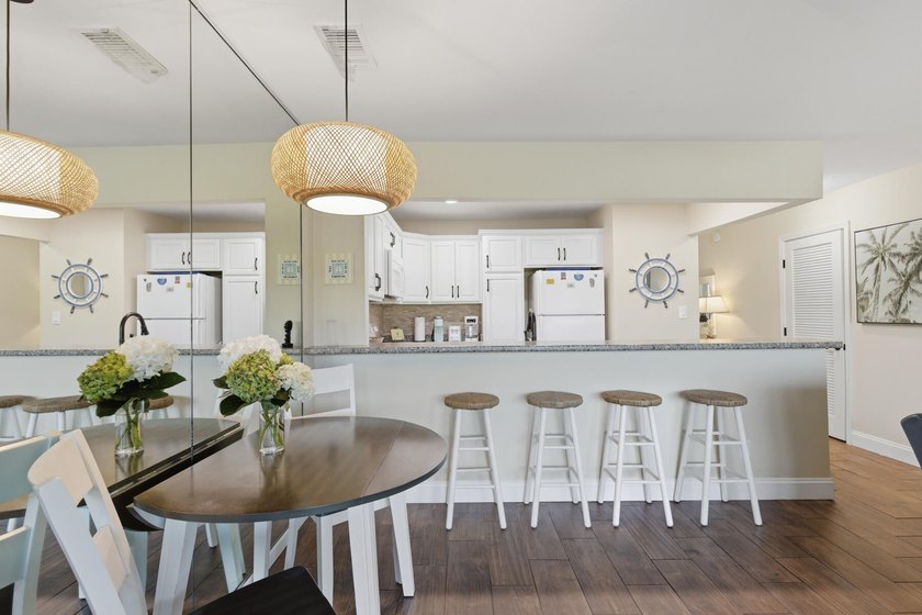 Experience living coastal at it's finest in this beautifully - photo 8
