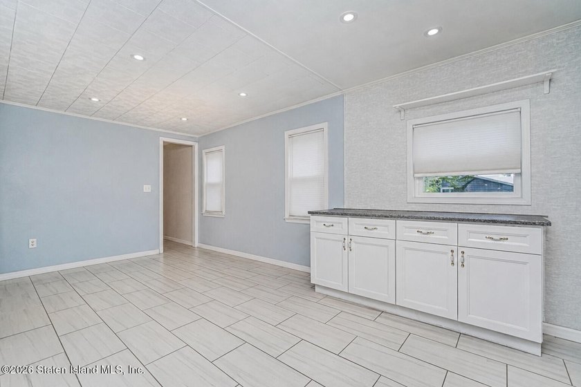 Welcome to 3524 Avenue P, a charming corner property located in - photo 9