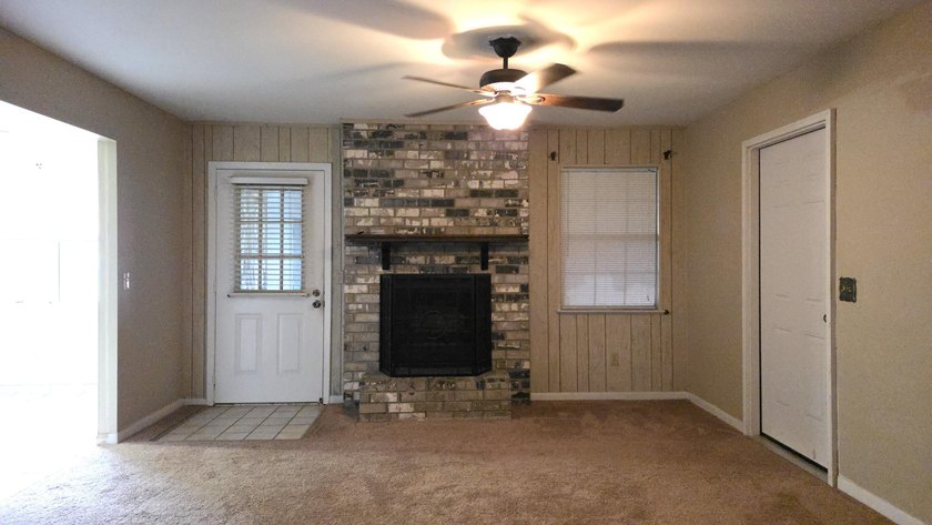 This 3-bedroom, 2-bath home with a garage and fenced backyard - photo 8