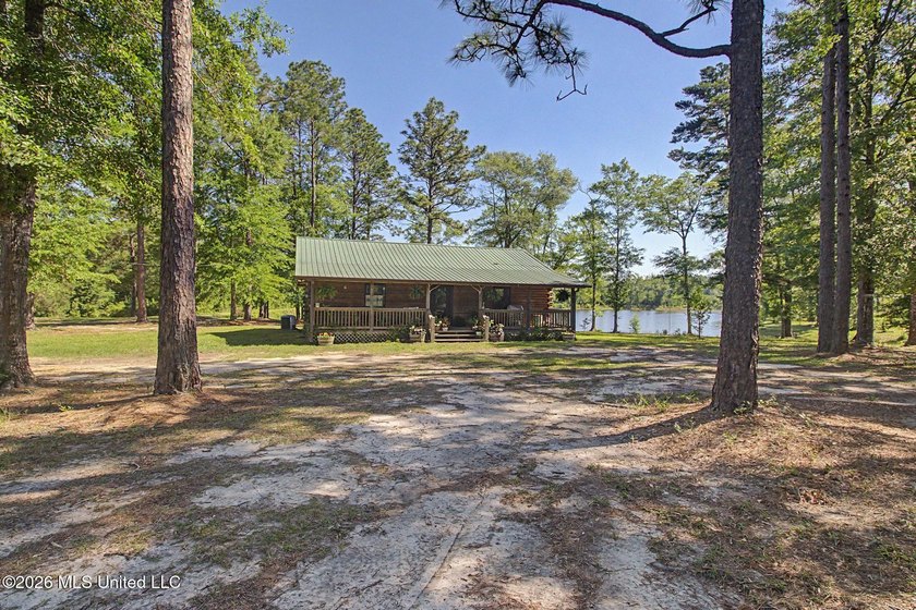 Tucked away among the rolling hills of South Mississippi, this - photo 12