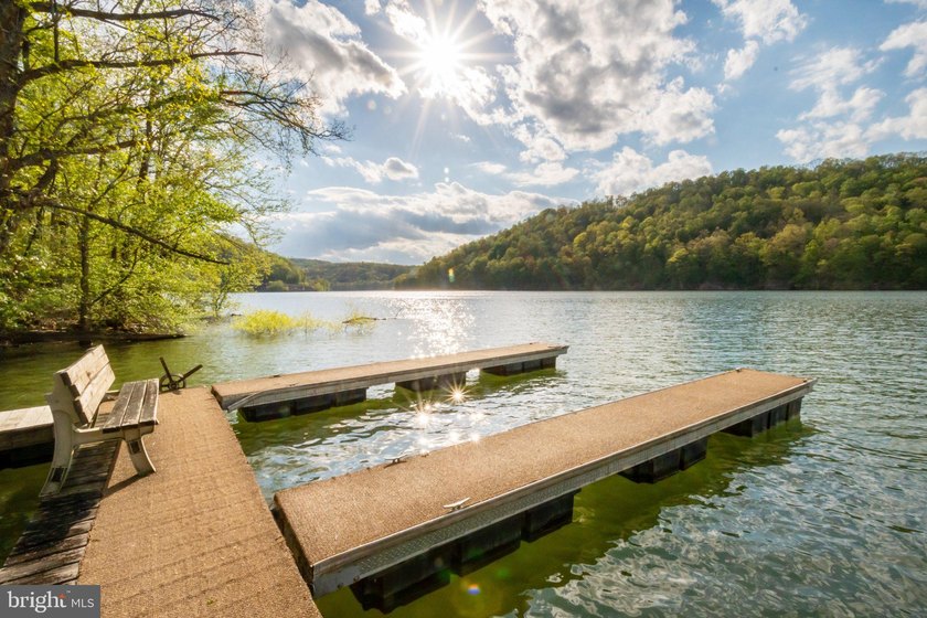 Beautiful stone lakefront home! This property has 2 parcels with - photo 13