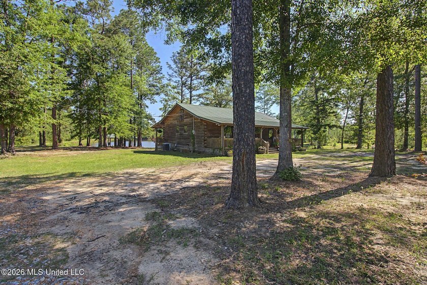 Tucked away among the rolling hills of South Mississippi, this - photo 14