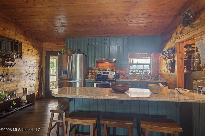 Tucked away among the rolling hills of South Mississippi, this - photo 20