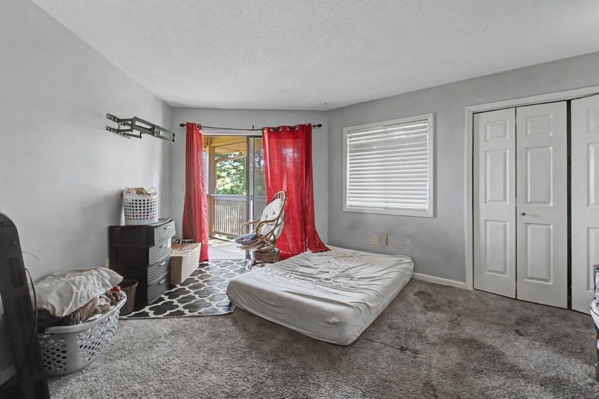 Welcome to this top-floor end-unit condo in Cypress Bay, located - photo 21