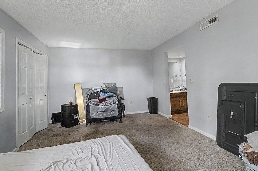 Welcome to this top-floor end-unit condo in Cypress Bay, located - photo 23