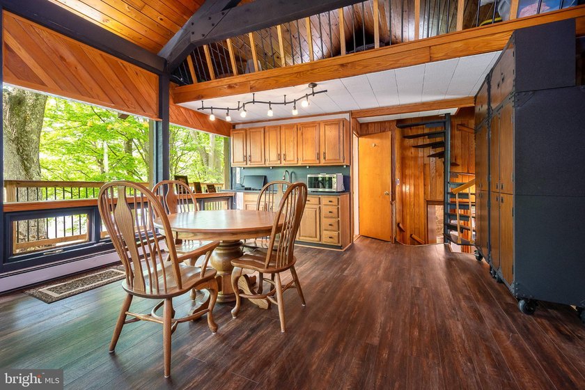 Beautiful stone lakefront home! This property has 2 parcels with - photo 23