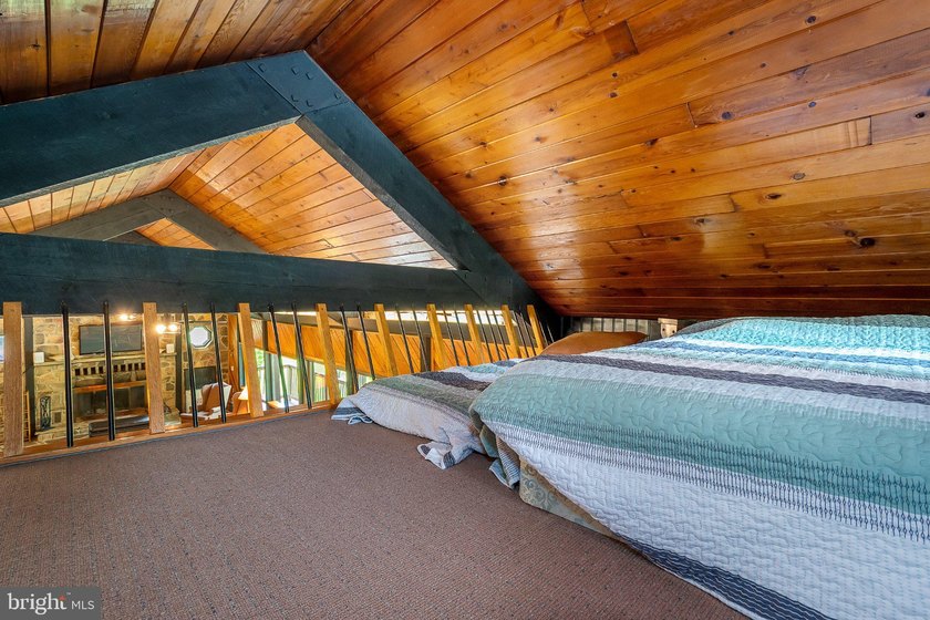 Beautiful stone lakefront home! This property has 2 parcels with - photo 24