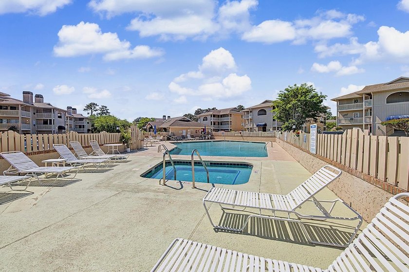 Welcome to this top-floor end-unit condo in Cypress Bay, located - photo 27
