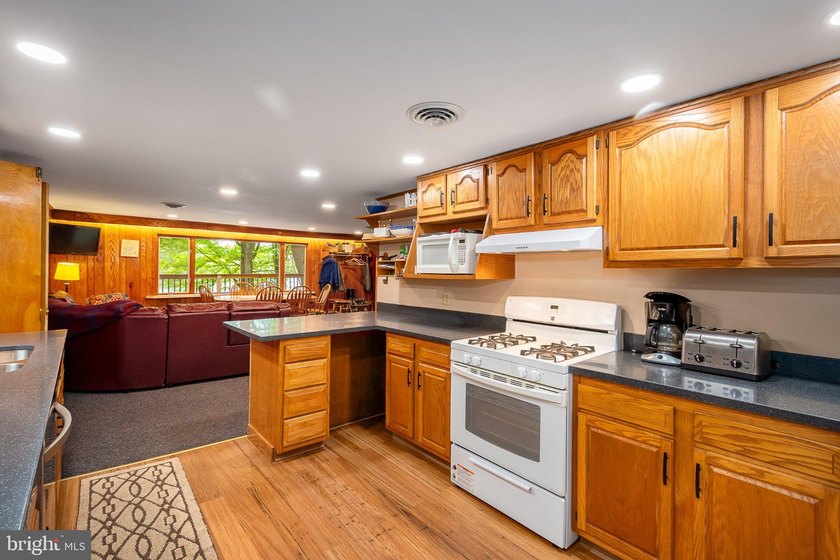 Beautiful stone lakefront home! This property has 2 parcels with - photo 28