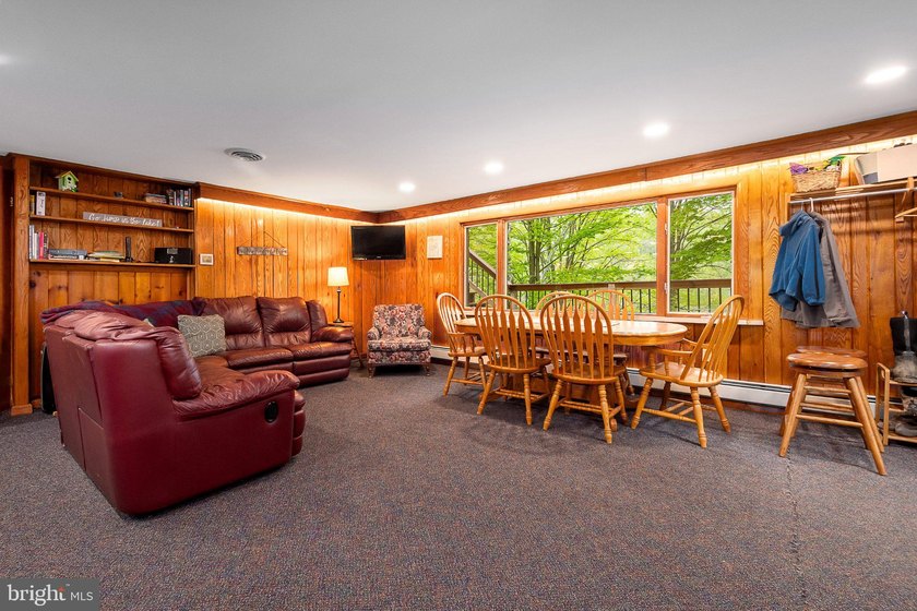 Beautiful stone lakefront home! This property has 2 parcels with - photo 29