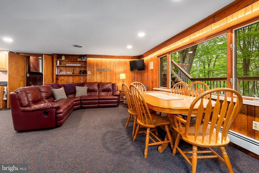 Beautiful stone lakefront home! This property has 2 parcels with - photo 30