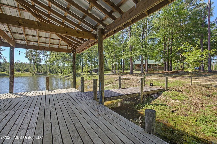 Tucked away among the rolling hills of South Mississippi, this - photo 31