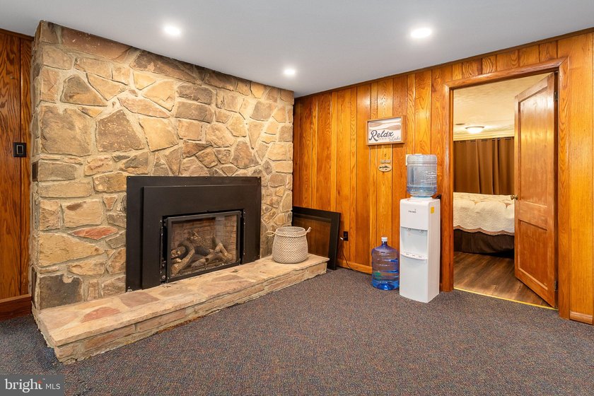 Beautiful stone lakefront home! This property has 2 parcels with - photo 32