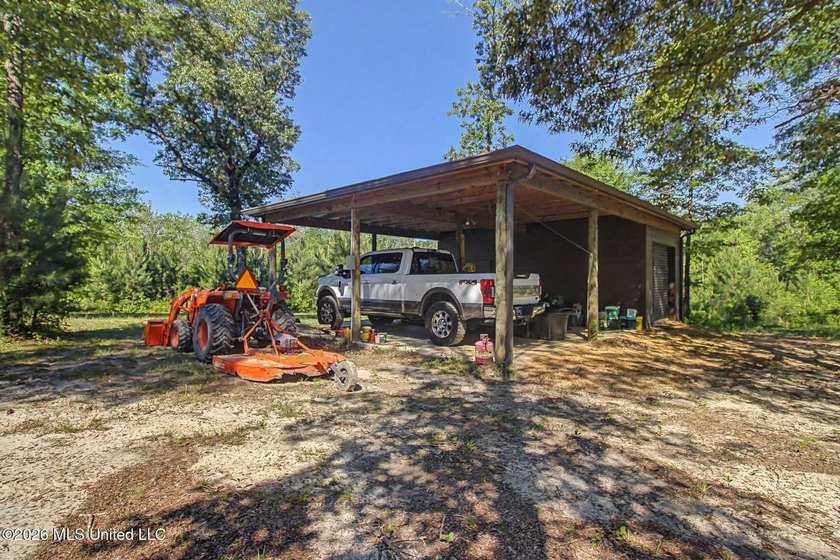 Tucked away among the rolling hills of South Mississippi, this - photo 34