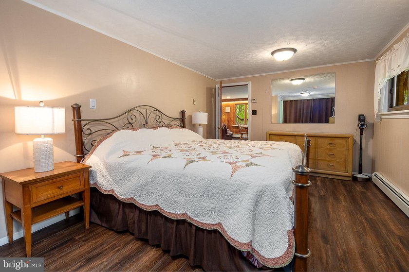 Beautiful stone lakefront home! This property has 2 parcels with - photo 34
