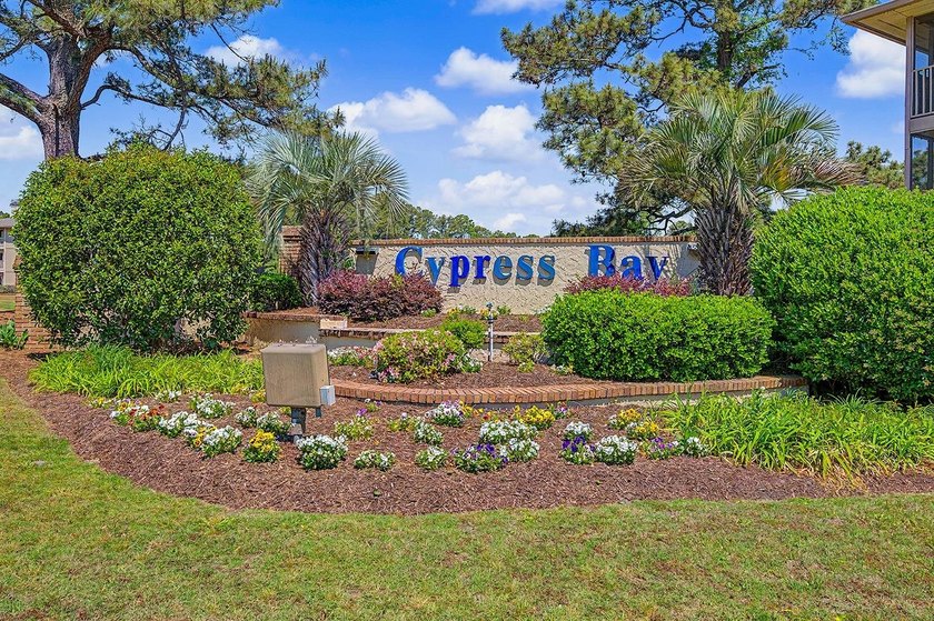 Welcome to this top-floor end-unit condo in Cypress Bay, located - photo 37