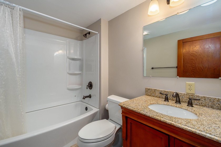 Beautiful stone lakefront home! This property has 2 parcels with - photo 39