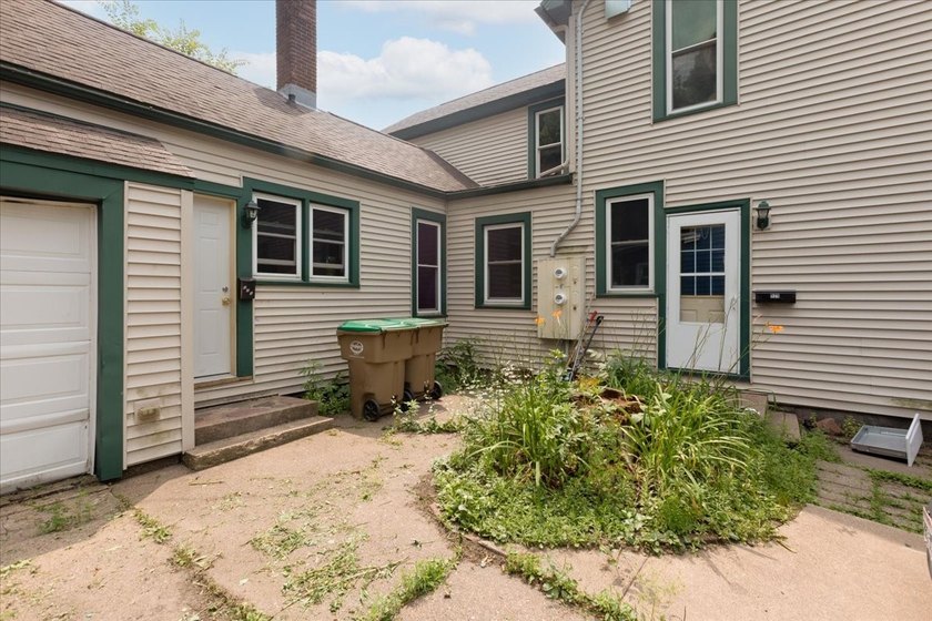 Excellent investment opportunity or ideal owner-occupant duplex! - photo 2