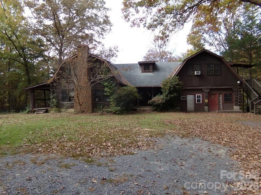 Large Log Home on 4.04+/- Acres already in 3 tax parcels or - photo 3