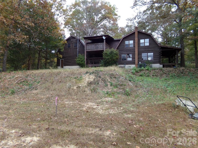 Large Log Home on 4.04+/- Acres already in 3 tax parcels or - photo 4