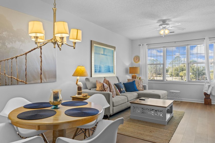 Beautiful 1-bedroom, 1-bath end unit located in the highly - photo 2