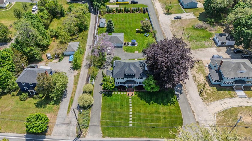 1928 Colonial in Riverhead - Tesla Solar Roof, 3-Car Heated - photo 8