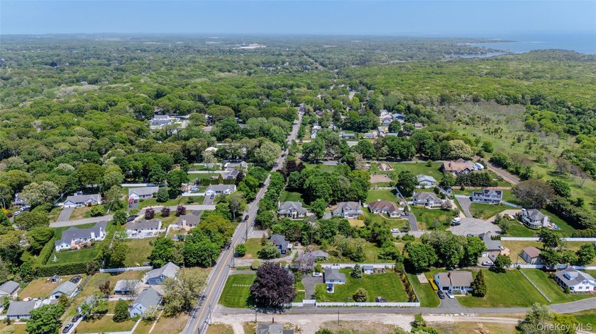 1928 Colonial in Riverhead - Tesla Solar Roof, 3-Car Heated - photo 9