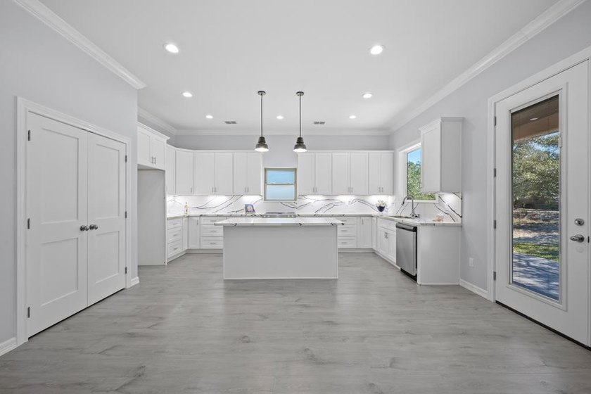 Beautiful new 3/2/2 home in secluded St. Andrews Place, nestled - photo 14