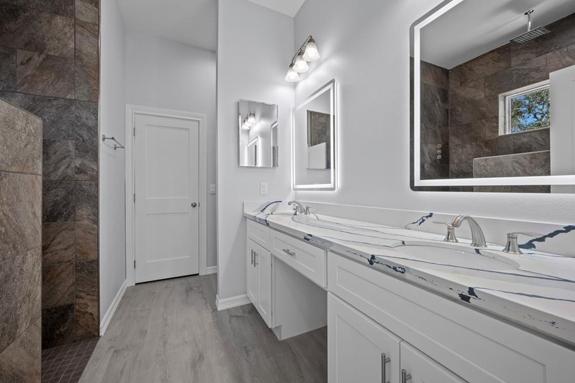 Beautiful new 3/2/2 home in secluded St. Andrews Place, nestled - photo 21