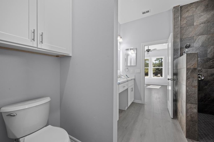 Beautiful new 3/2/2 home in secluded St. Andrews Place, nestled - photo 23