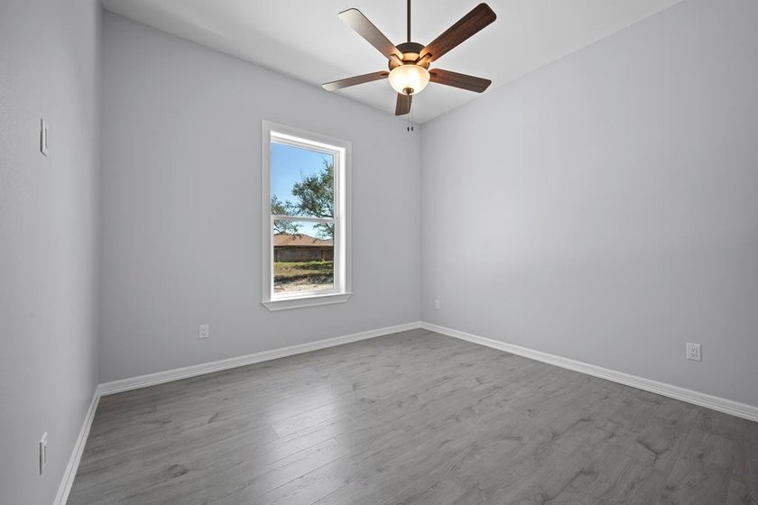 Beautiful new 3/2/2 home in secluded St. Andrews Place, nestled - photo 28