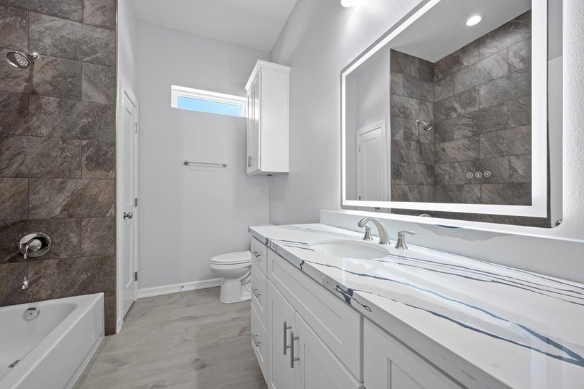 Beautiful new 3/2/2 home in secluded St. Andrews Place, nestled - photo 30