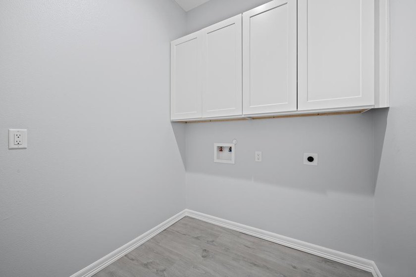 Beautiful new 3/2/2 home in secluded St. Andrews Place, nestled - photo 36