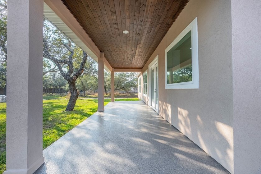 Beautiful new 3/2/2 home in secluded St. Andrews Place, nestled - photo 39