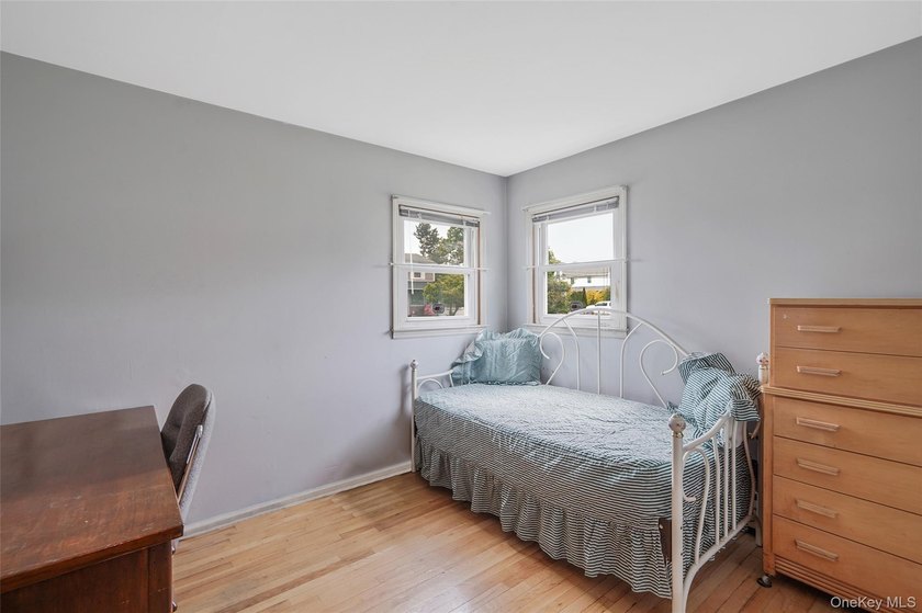 This spacious five-bedroom, two-full-bath corner-lot home in - photo 13