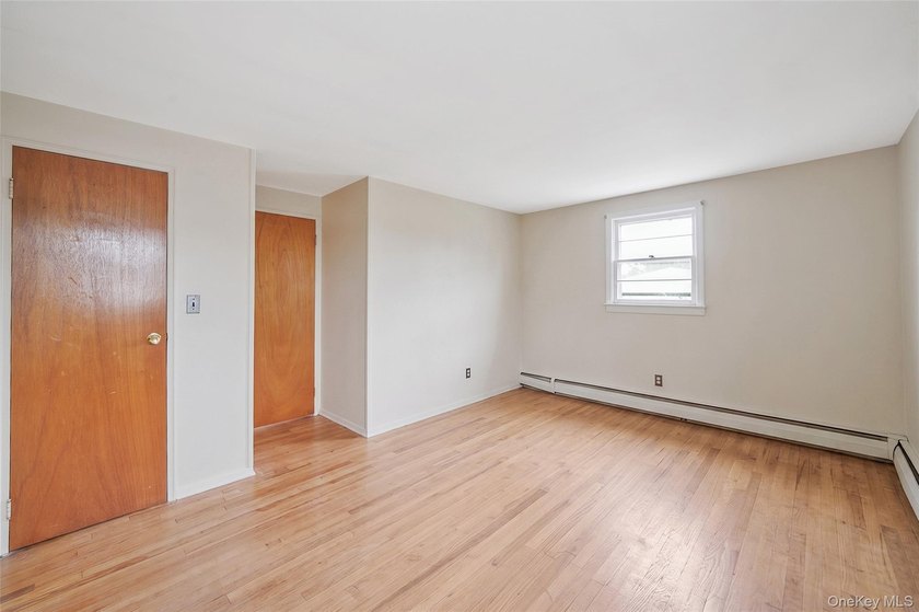 This spacious five-bedroom, two-full-bath corner-lot home in - photo 16
