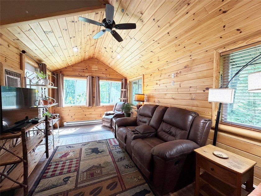 Enjoy peaceful riverfront living in this charming 1-bedroom - photo 10