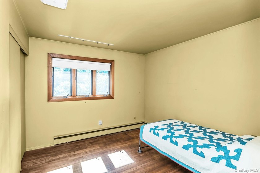 Ranch with 3 bedrooms and two full baths set on a 1/2 acre of - photo 18