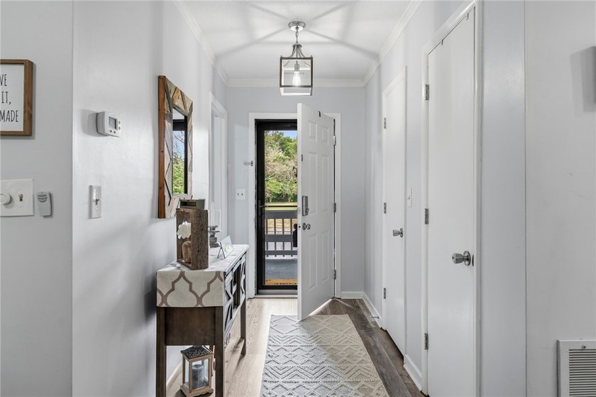 Wake up to lake views and enjoy carefree living in this - photo 4