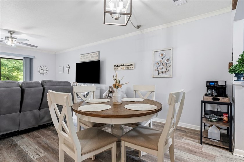 Wake up to lake views and enjoy carefree living in this - photo 8