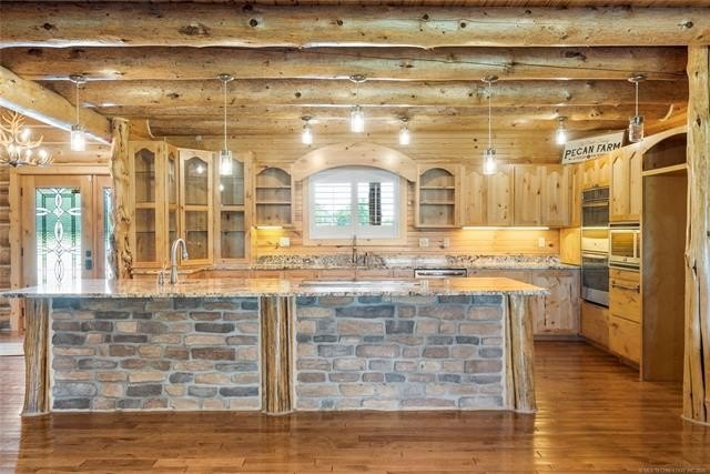 This meticulous, custom log home is high quality in design - photo 10