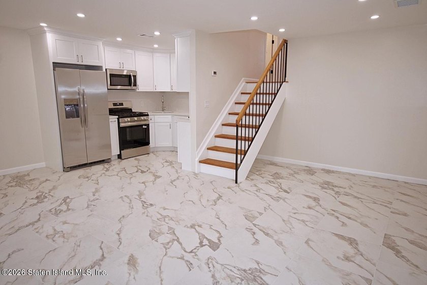 NO NEED TO RENT WHEN YOU CAN OWN THIS BEAUTIFUL NEWLY RENOVATED - photo 6