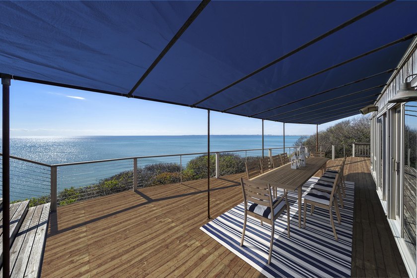 Perched high above Cape Cod Bay with sweeping views to - photo 3